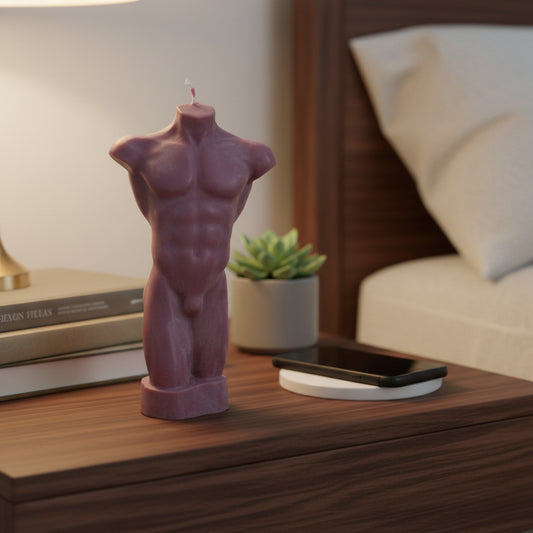 a brown male torso candle on a nightstand