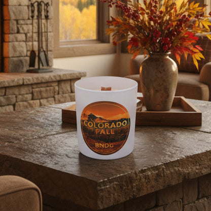 white candle jar on a stone table in a living room
