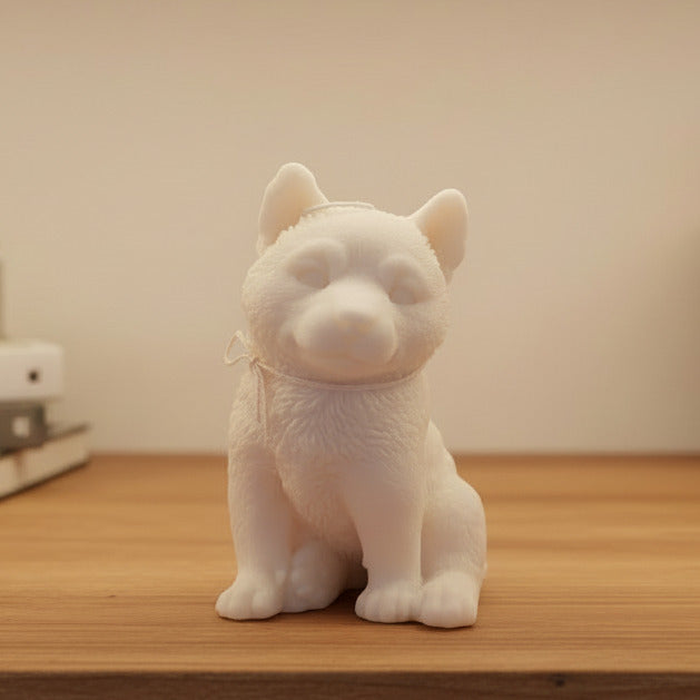 white husky puppy candle on a display shelf