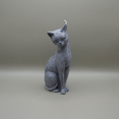 grey palmwax shy candle on light grey surface