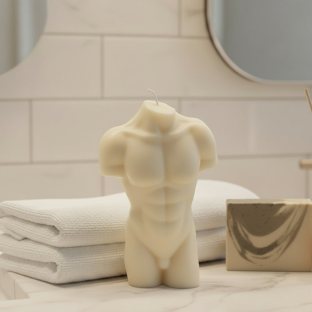 a white male torso candle on a bathroom counter