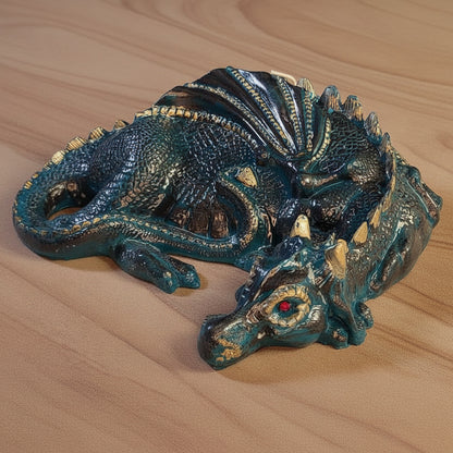 hand-painted lazy dragon candle on sandstone surface
