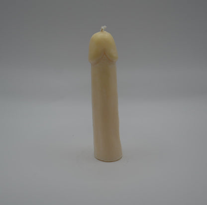 white penis pillar candle on light grey background
