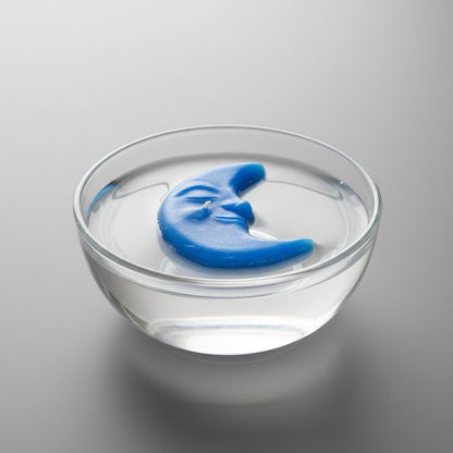 Floating candle in a bowl of water