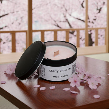 Cherry Blossom Candle tin on a table with cherry blossoms and cherry trees outside
