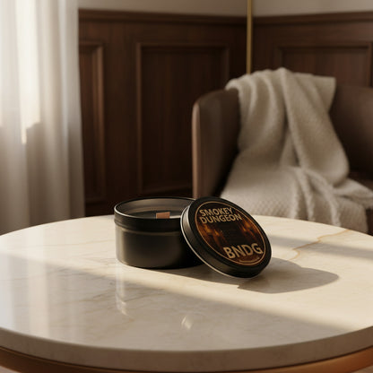 a candle tin with "Smokey Dungeon"-scent in a cozy room