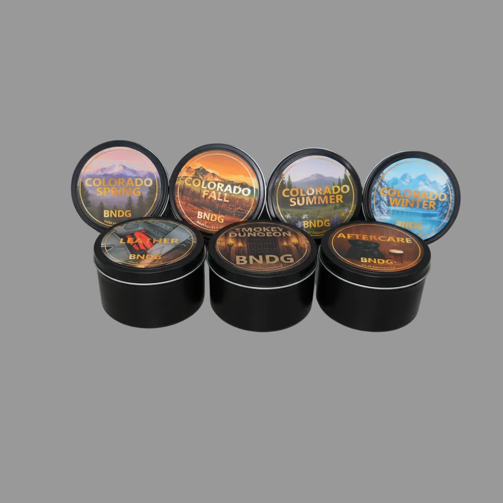 7 different scented candle tins with labels