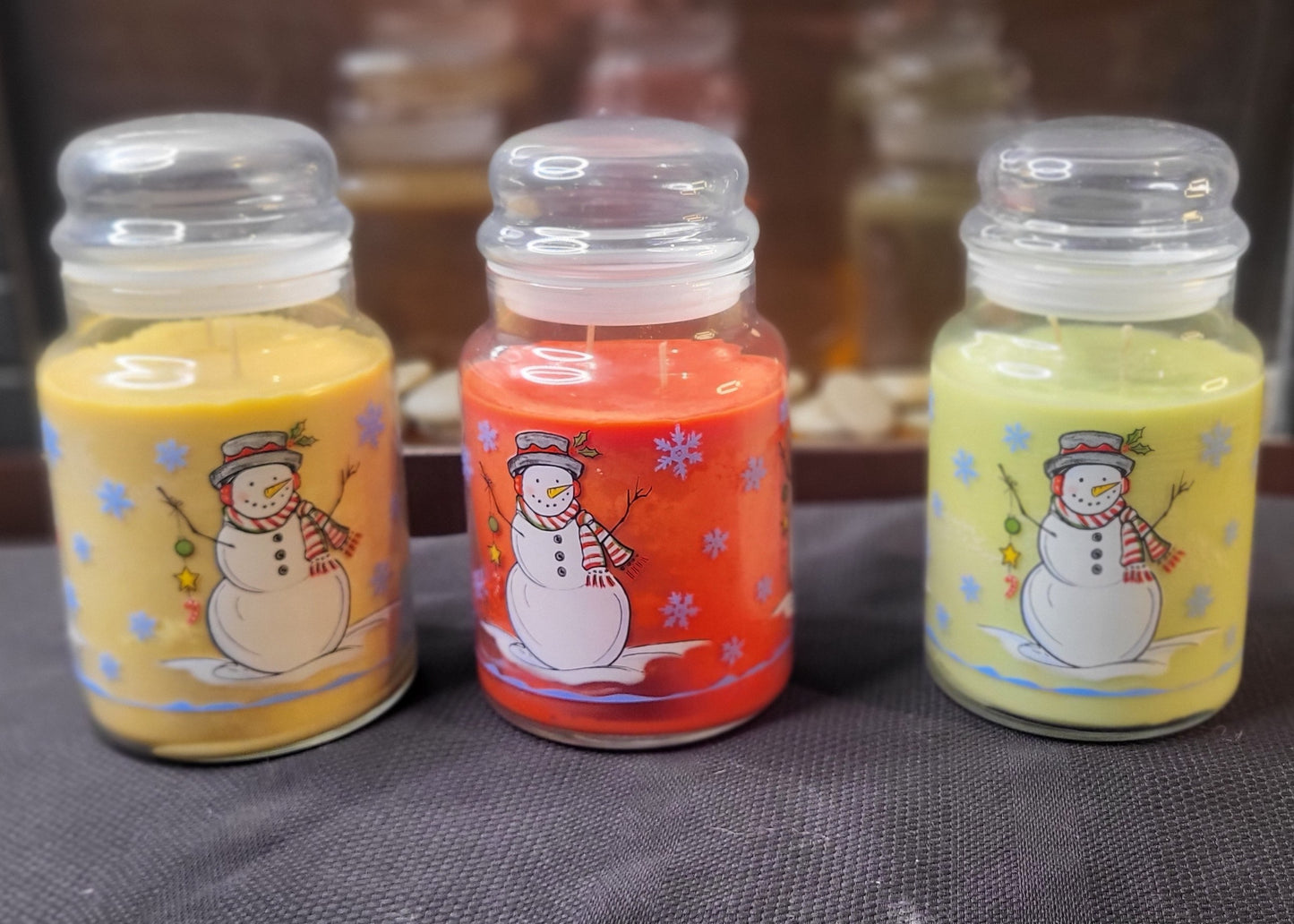 3 candle jars with smowman design
